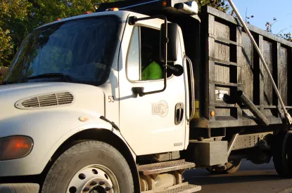 City loading truck