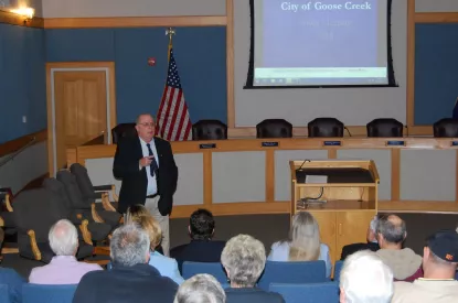 Mayor Heitzler speaking at town meeting