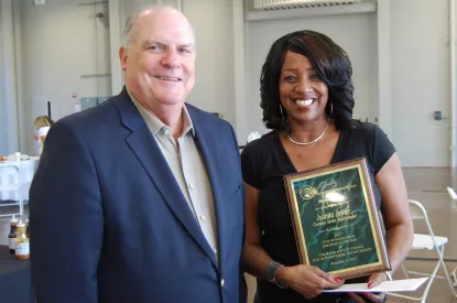 Employee of Year Juanita Joiner with Mayor Heitzler