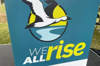 We All Rise sign