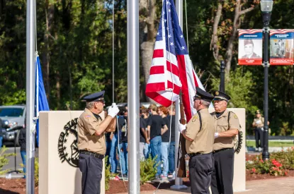 American Flag being raised