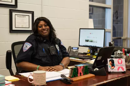 Officer Bodison at her desk